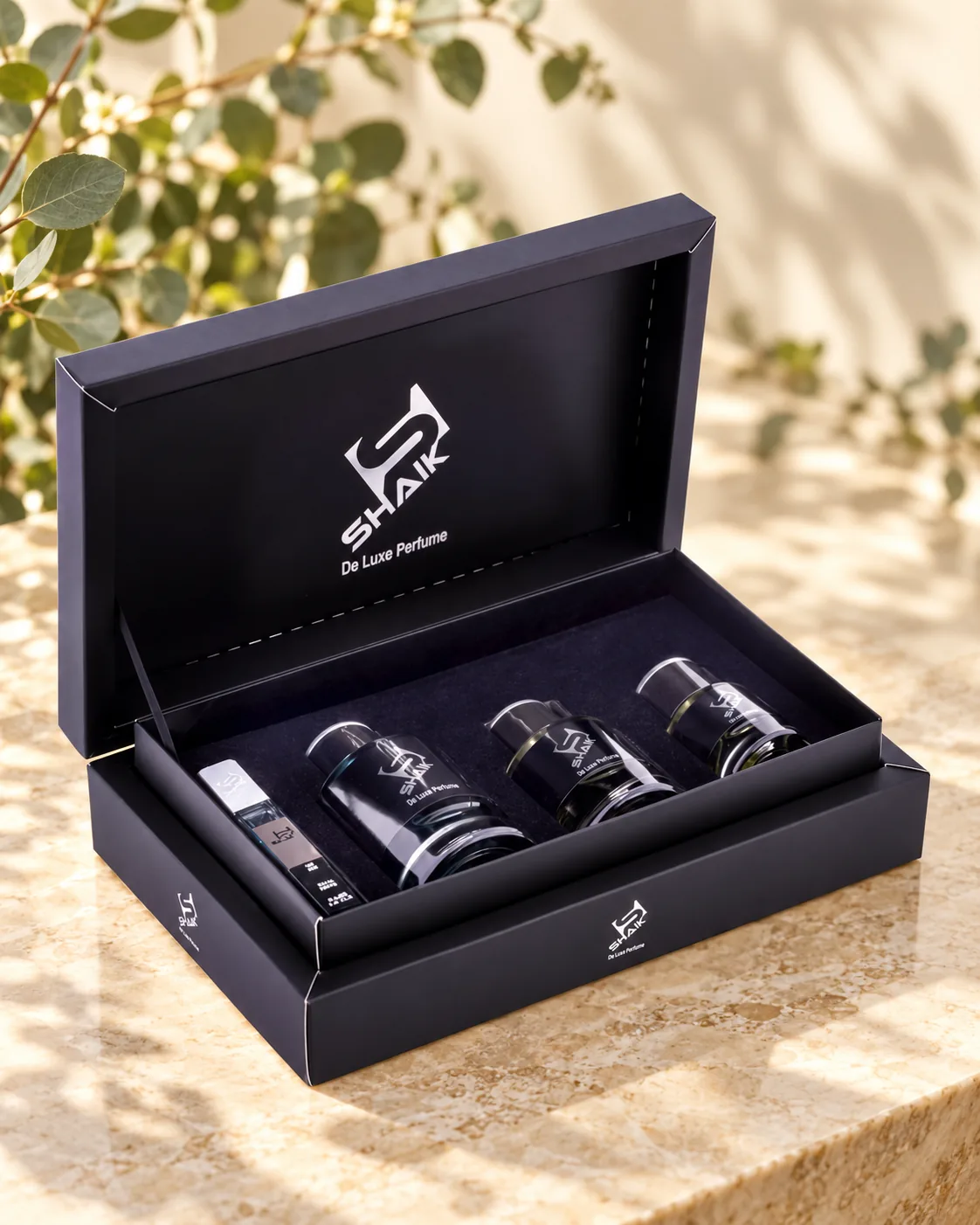 Shaik Gift Set No. 2: black gift box with three perfumes and a travel spray, another view