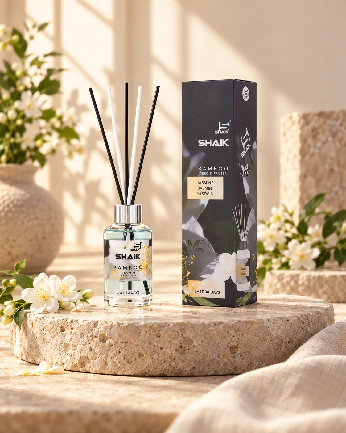 Shaik Jasmine Reed Diffuser on a stone display