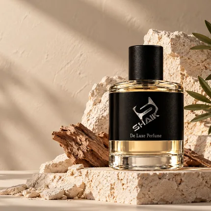 Shaik men's perfume with black cap and label on ivory stone