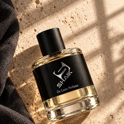 Shaik men's perfume with black cap and label on dark linen