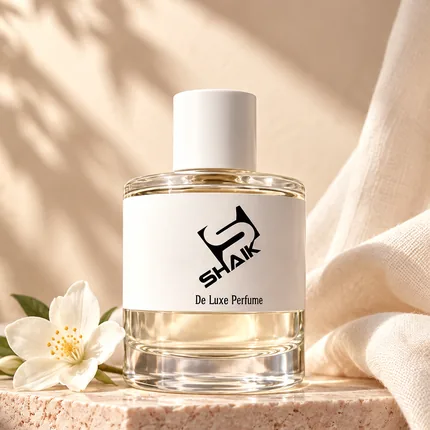 Shaik women's perfume with white cap and label beside white blossom