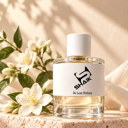 Shaik women's perfume with white cap and label beside jasmine flowers