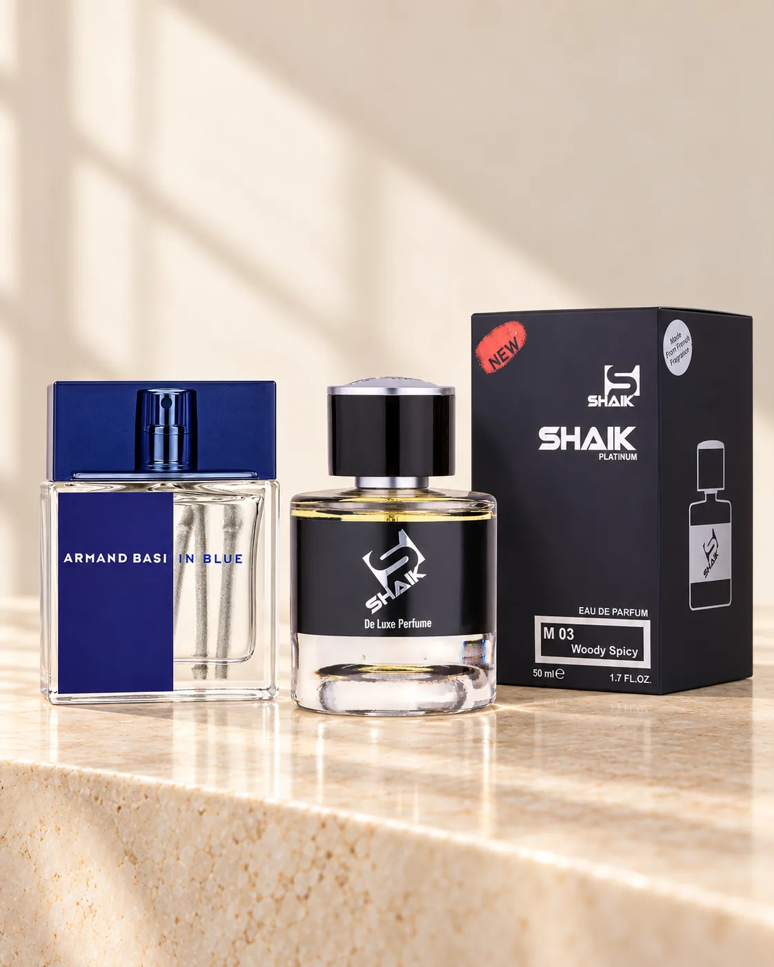 Shaik M 03 bottle and box beside Armand Basi In Blue, the fragrance that inspired it