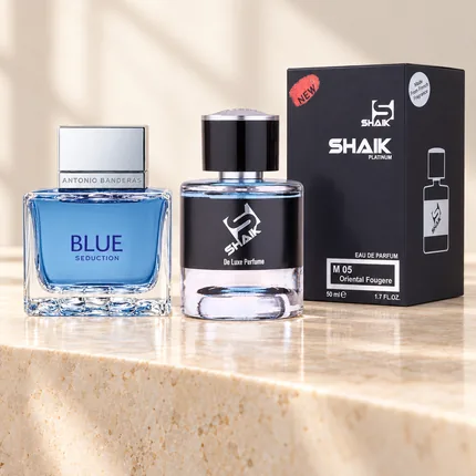Shaik M 05 bottle and box beside Antonio Banderas Blue Seduction, the fragrance that inspired it