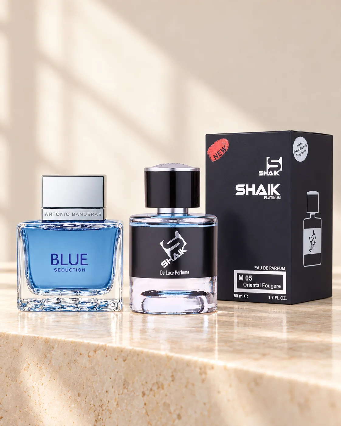 Shaik M 05 bottle and box beside Antonio Banderas Blue Seduction, the fragrance that inspired it