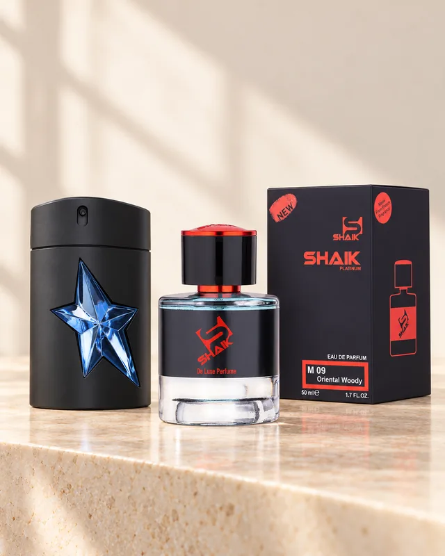 Shaik M 09 bottle and box beside Mugler A*Men, the fragrance that inspired it