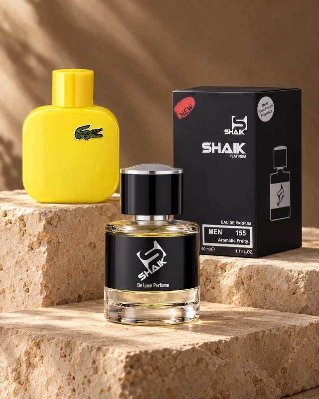 Shaik M 155 bottle and box beside Eau de Lacoste L.12.12 Yellow (Jaune), the fragrance that inspired it