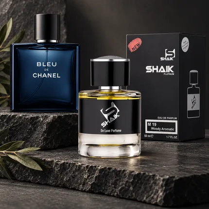 Shaik M 19 bottle and box beside Bleu de Chanel, the fragrance that inspired it
