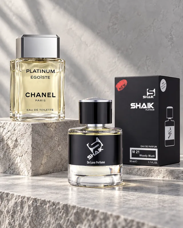 Shaik M 21 bottle and box beside Chanel Egoiste Platinum, the fragrance that inspired it