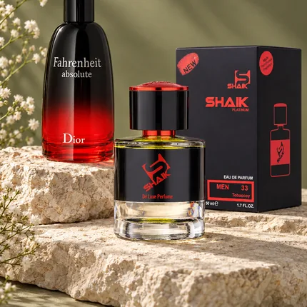 Shaik M 33 bottle and box beside Dior Fahrenheit Absolute, the fragrance that inspired it
