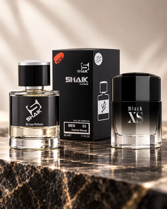 Shaik M 93 bottle and box beside Paco Rabanne Black XS, the fragrance that inspired it