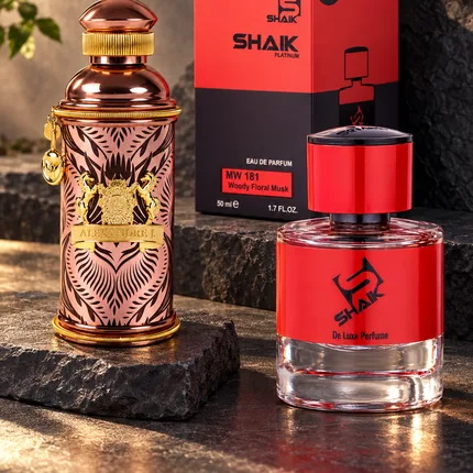 Shaik MW 181 bottle and box beside Alexandre.J Morning Muscs, the fragrance that inspired it