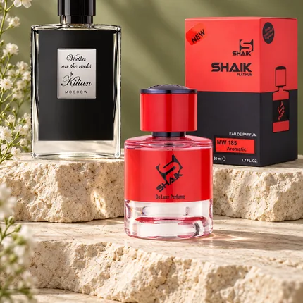 Shaik MW 185 bottle and box beside Kilian Vodka on the Rocks, the fragrance that inspired it