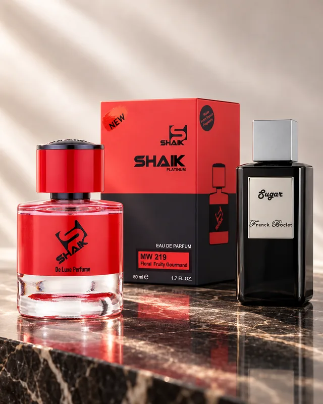 Shaik MW 219 bottle and box beside Franck Boclet Sugar, the fragrance that inspired it