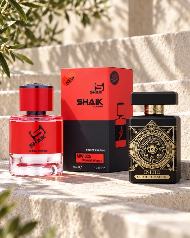 Shaik MW 325 bottle and box beside Initio Oud for Greatness, the fragrance that inspired it