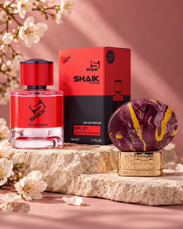 Shaik MW 327 bottle and box beside The House of Oud Grape Pearls, the fragrance that inspired it