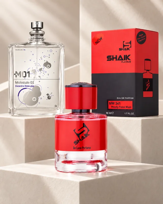 Shaik MW 341 bottle and box beside Escentric Molecules Molecule 01, the fragrance that inspired it