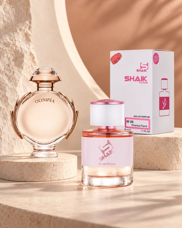Shaik W 06 bottle and box beside Paco Rabanne Olympéa, the fragrance that inspired it