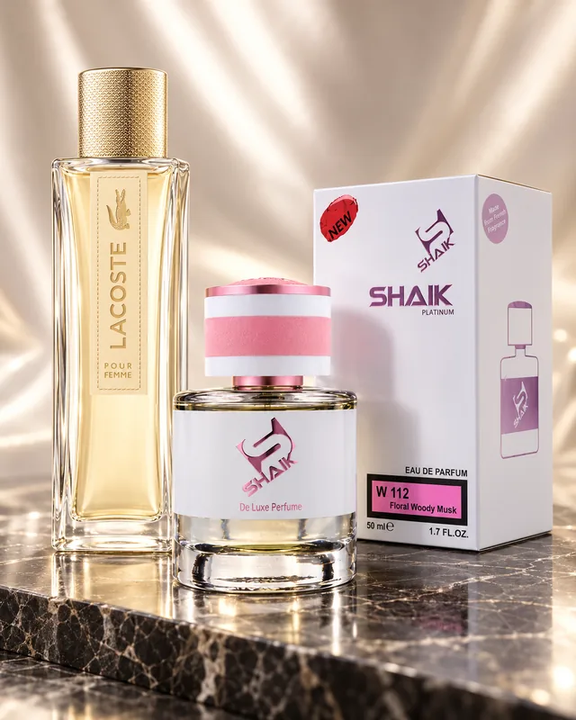 Shaik W 112 bottle and box beside Lacoste Pour Femme, the fragrance that inspired it
