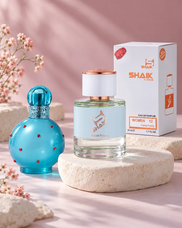 Shaik W 12 bottle and box beside Britney Spears Circus Fantasy, the fragrance that inspired it