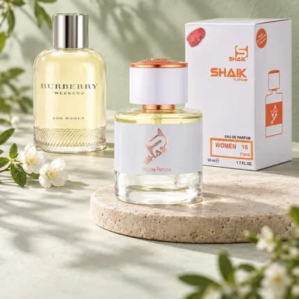 Shaik W 16 bottle and box beside Burberry Weekend, the fragrance that inspired it