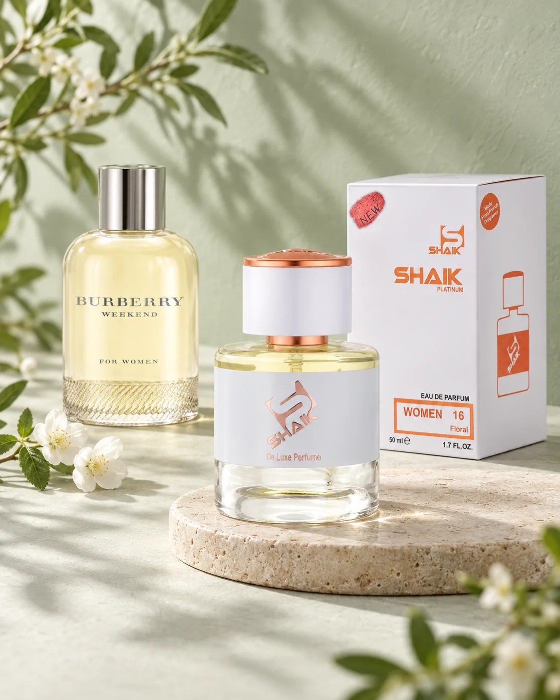 Shaik W 16 bottle and box beside Burberry Weekend, the fragrance that inspired it
