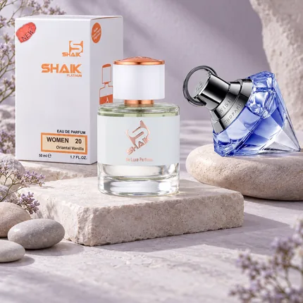Shaik W 20 bottle and box beside Chopard Wish, the fragrance that inspired it