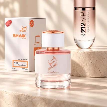 Shaik W 28 bottle and box beside Carolina Herrera 212 VIP Rose, the fragrance that inspired it