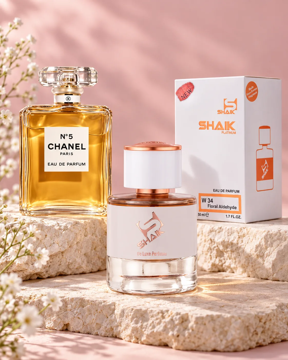 Shaik W 34 bottle and box beside Chanel N°5, the fragrance that inspired it