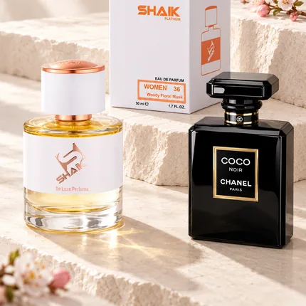 Shaik W 36 bottle and box beside Chanel Coco Noir, the fragrance that inspired it