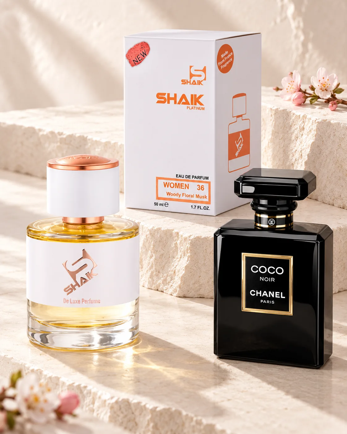 Shaik W 36 bottle and box beside Chanel Coco Noir, the fragrance that inspired it