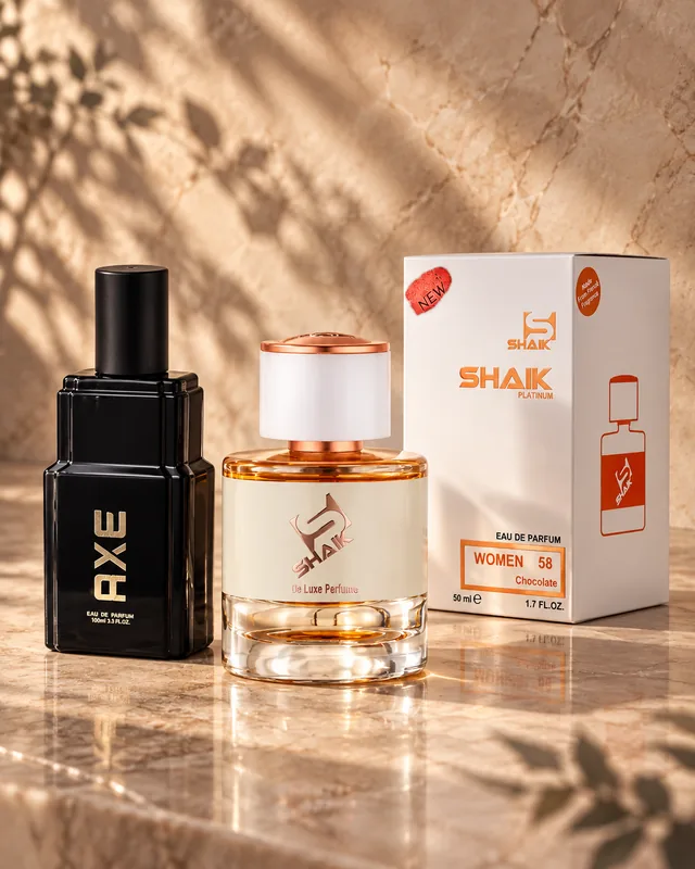 Shaik W 58 bottle and box beside Axe Chocolate Caramel, the fragrance that inspired it